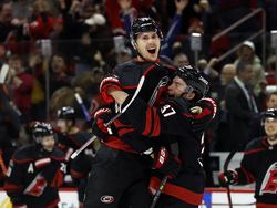 APTOPIX Sharks Hurricanes Hockey