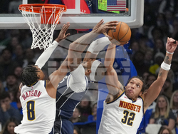 APTOPIX Nuggets Mavericks Basketball