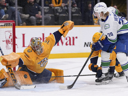 APTOPIX Canucks Predators Hockey