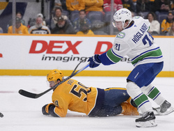 APTOPIX Canucks Predators Hockey