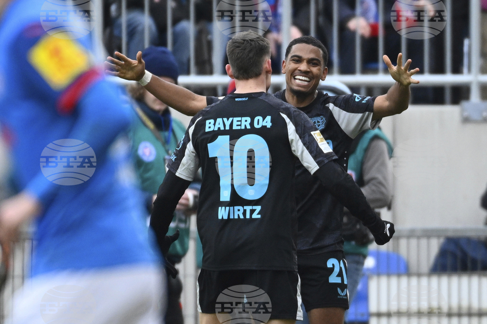 Байер Леверкузен се справи при гостуването си на Холщайн Кил и скъси дистанцията с Байерн Мюнхен в Бундеслигата