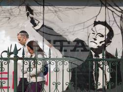 APTOPIX Romania Elon Musk Graffiti