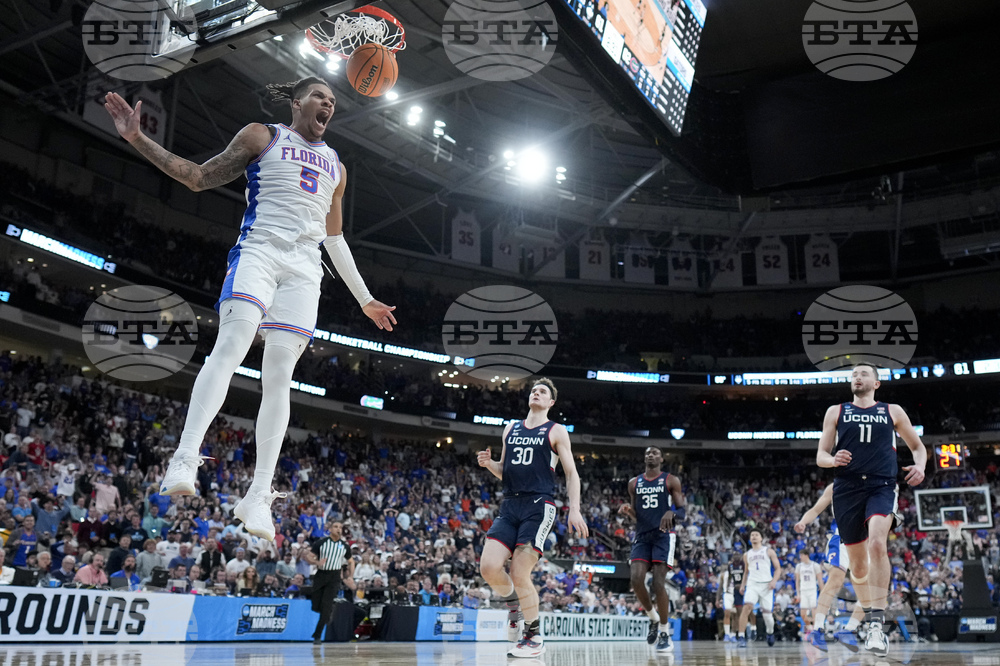 APTOPIX NCAA UConn Florida Basketball