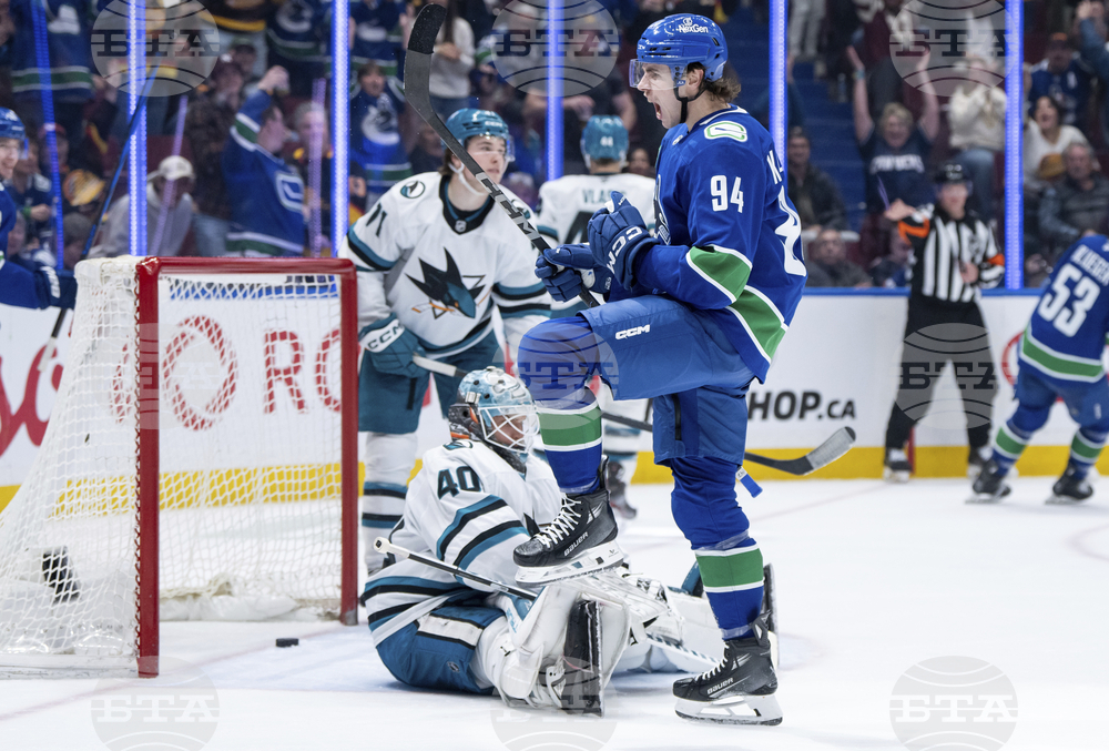 APTOPIX Sharks Canucks Hockey