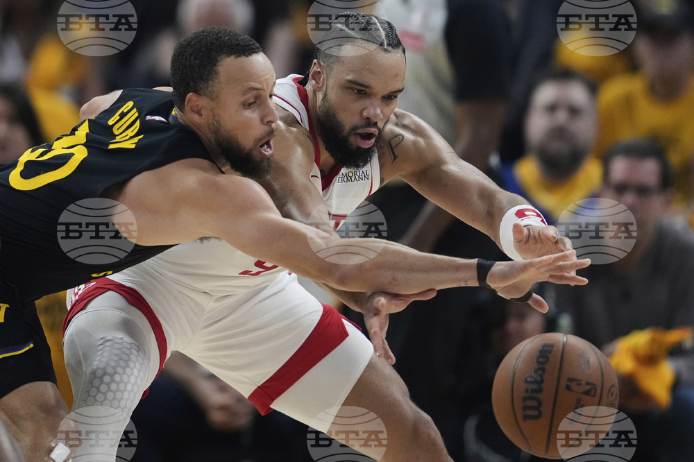 APTOPIX Rockets Warriors Basketball