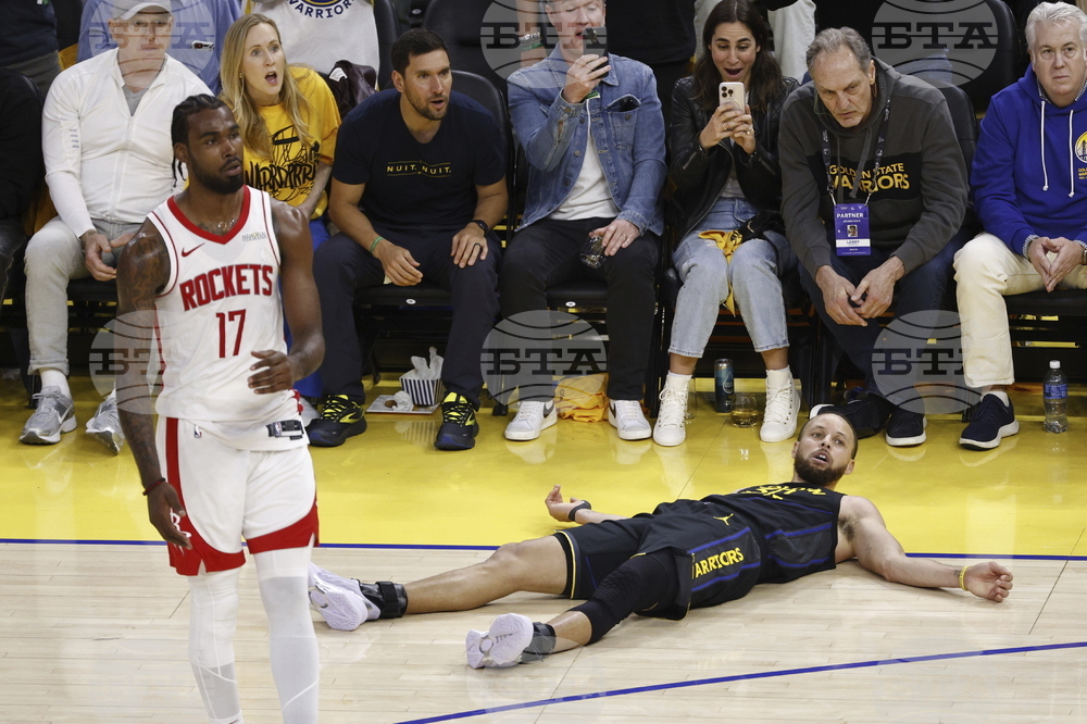 APTOPIX Rockets Warriors Basketball