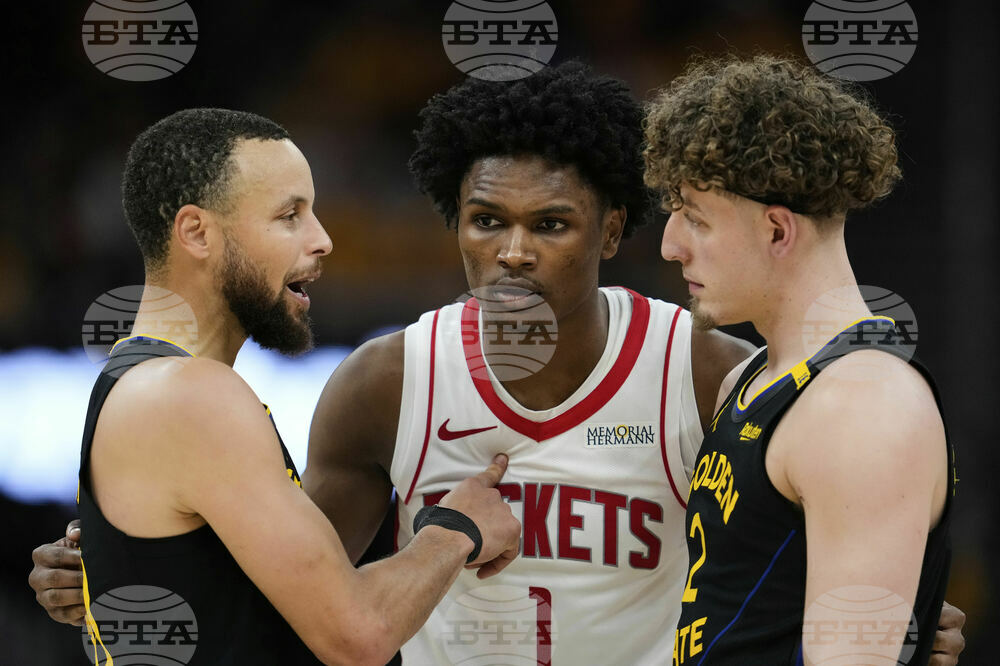 APTOPIX Rockets Warriors Basketball