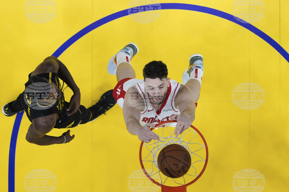 APTOPIX Rockets Warriors Basketball
