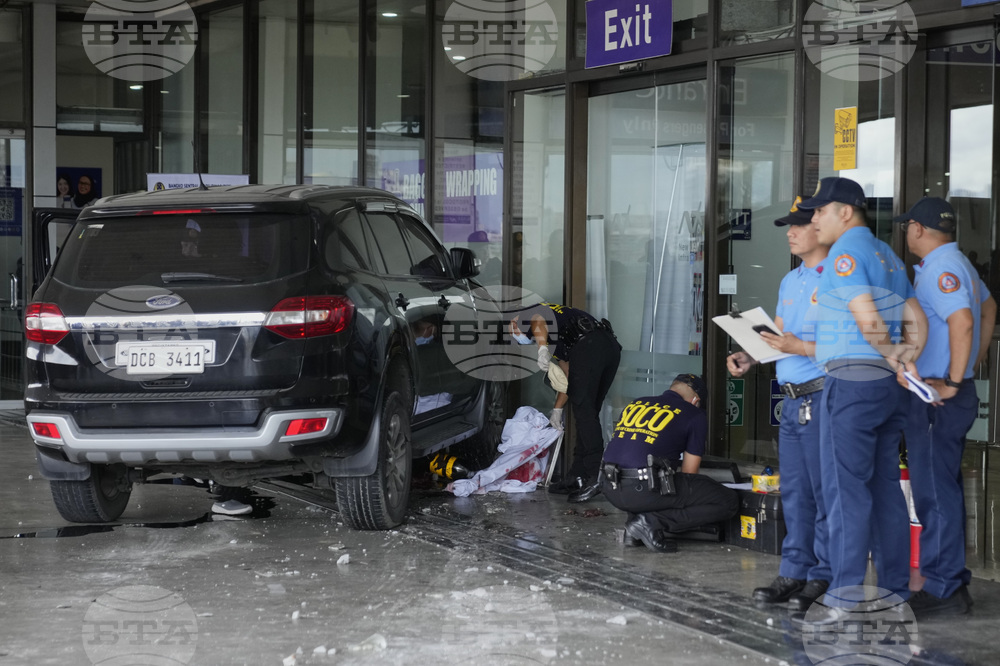 APTOPIX Philippines Airport Vehicle Accident