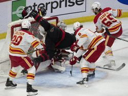 APTOPIX Flames Senators Hockey