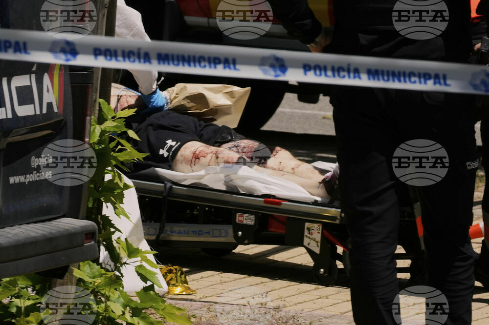 CORRECTION Spain Ukraine Shooting