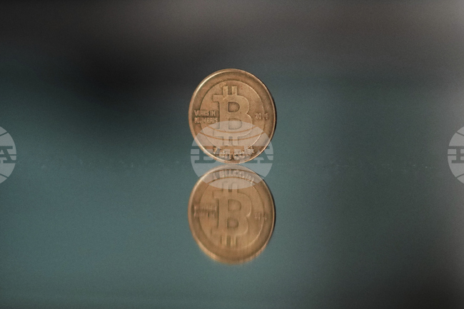 Биткойнът достигна нов рекорден връх благодарение на търсенето от големи финансови институции и благоприятната среда в САЩ