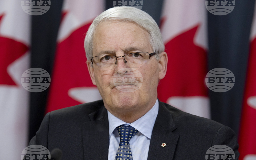 Canada Obit Garneau