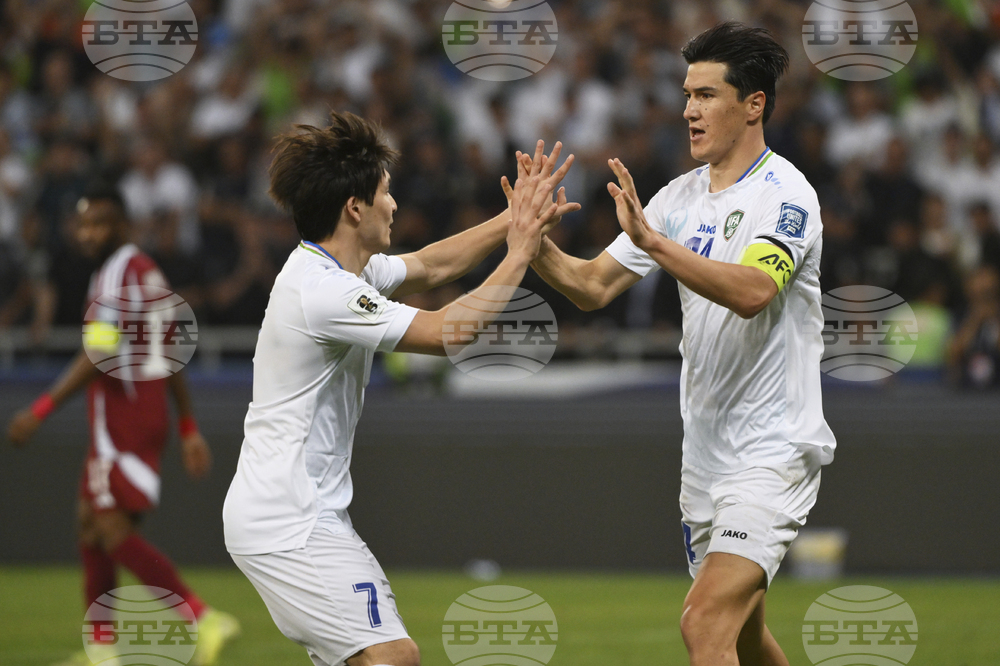 Uzbekistan Qatar WCup Soccer