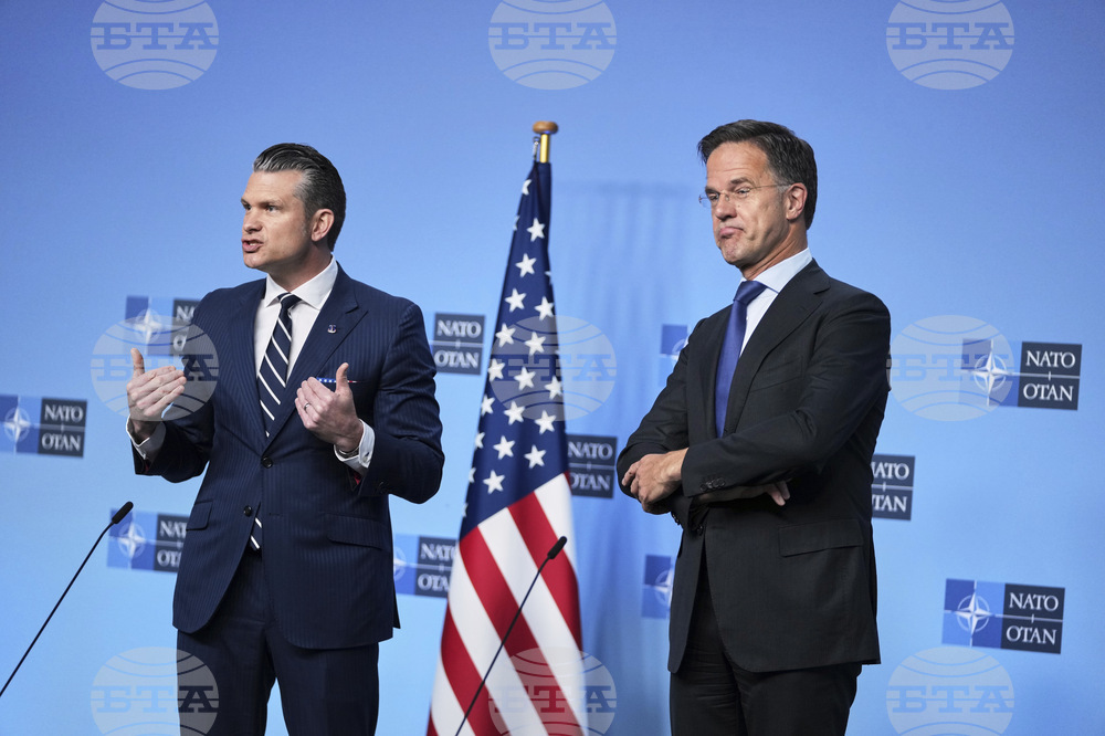 ADVANCE TO GO WITH STORY NATO Summit Spending