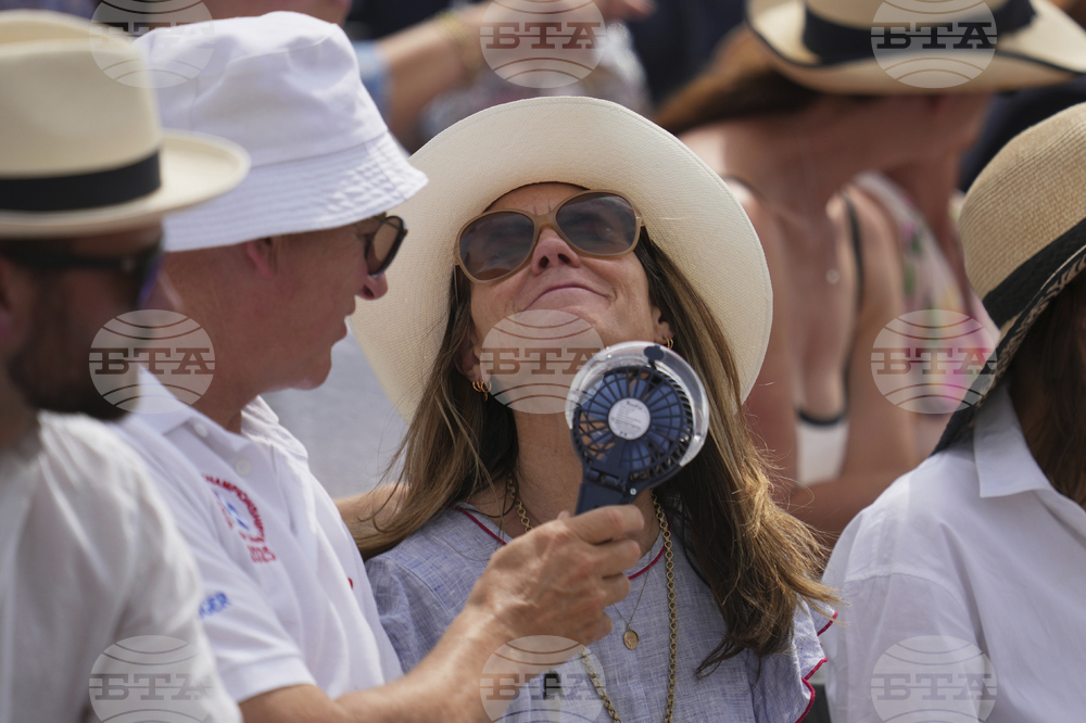 APTOPIX Britain Tennis Queens Club Weather