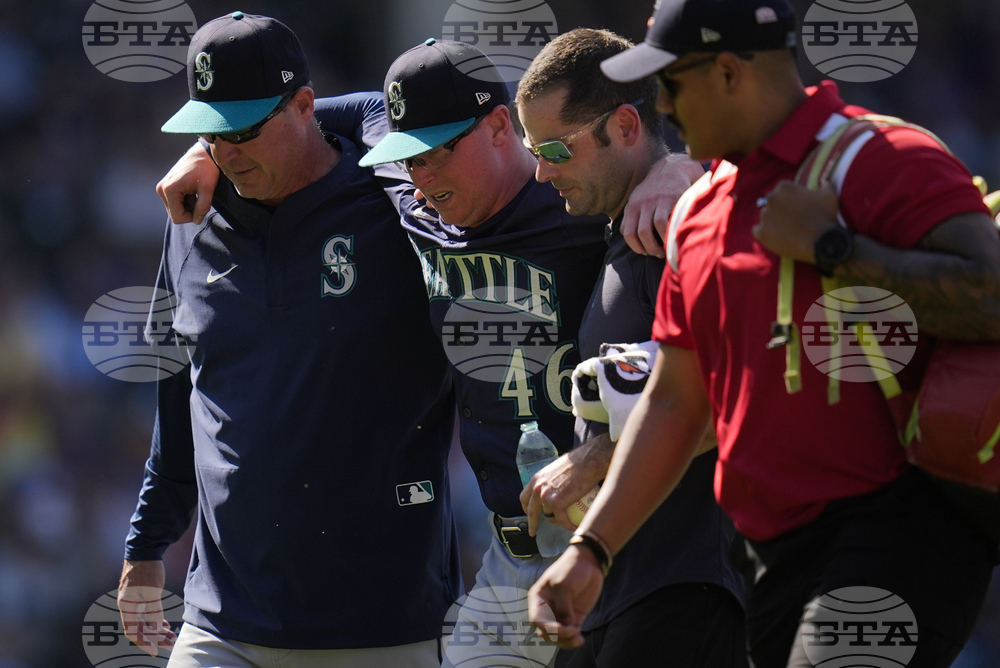 APTOPIX Mariners Cubs Baseball Heat Wave Weather