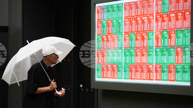 Токио затвори смесено преди публикуването на отчета на „Софтбанк груп“, Уолстрийт възстанови по-голямата част от загубата си от миналата седмица