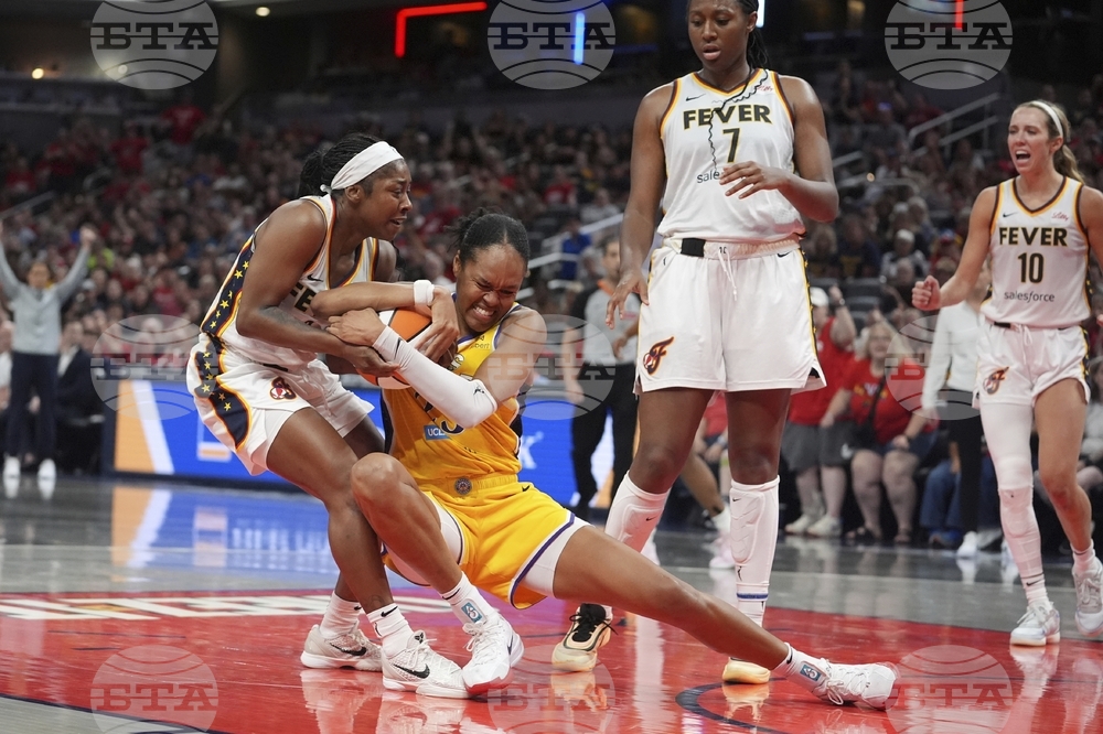 APTOPIX Sparks Fever Basketball