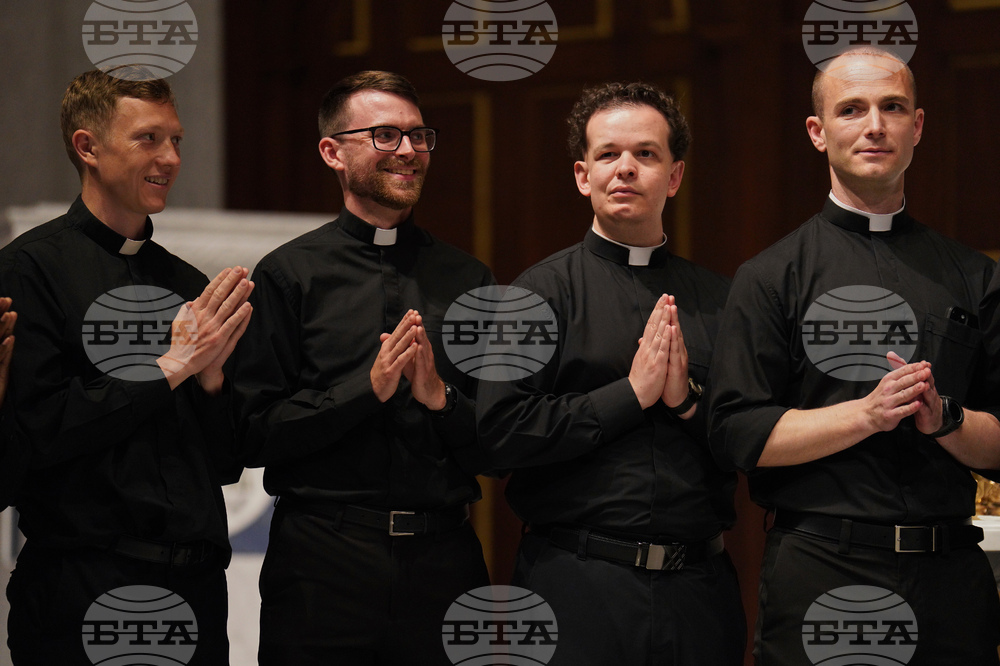 CORRECTION Twelve New Priests