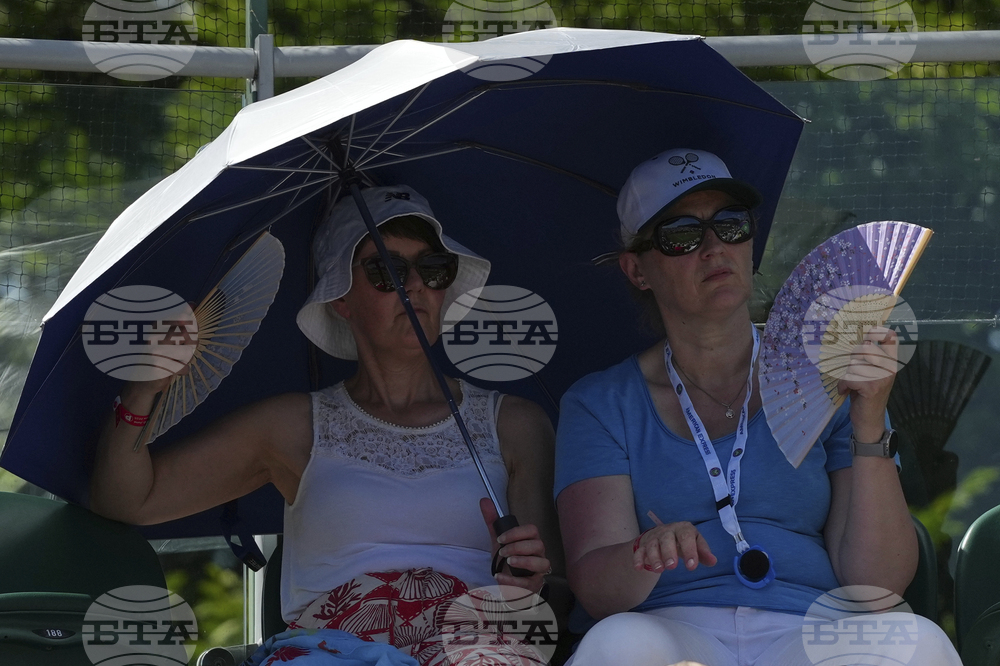 Britain Wimbledon Tennis Extreme Weather Heat