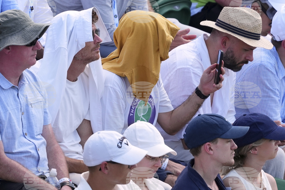 Britain Wimbledon Tennis Extreme Weather Heat