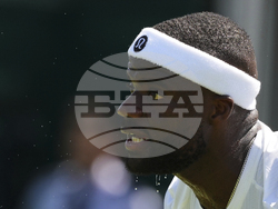 Britain Wimbledon Tennis Extreme Weather Heat