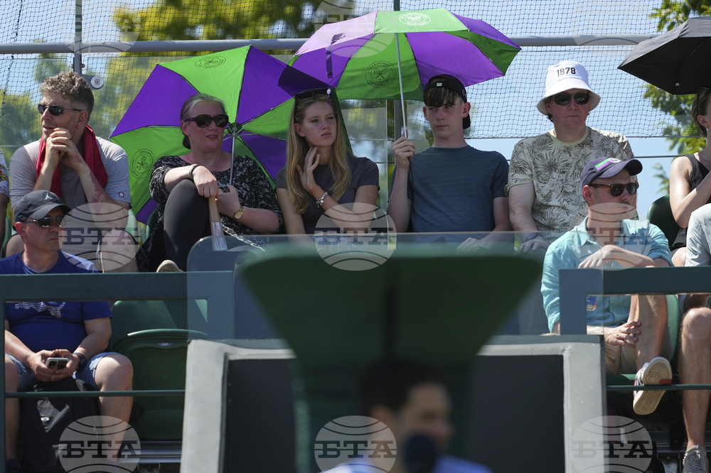 Britain Wimbledon Tennis Extreme Weather Heat