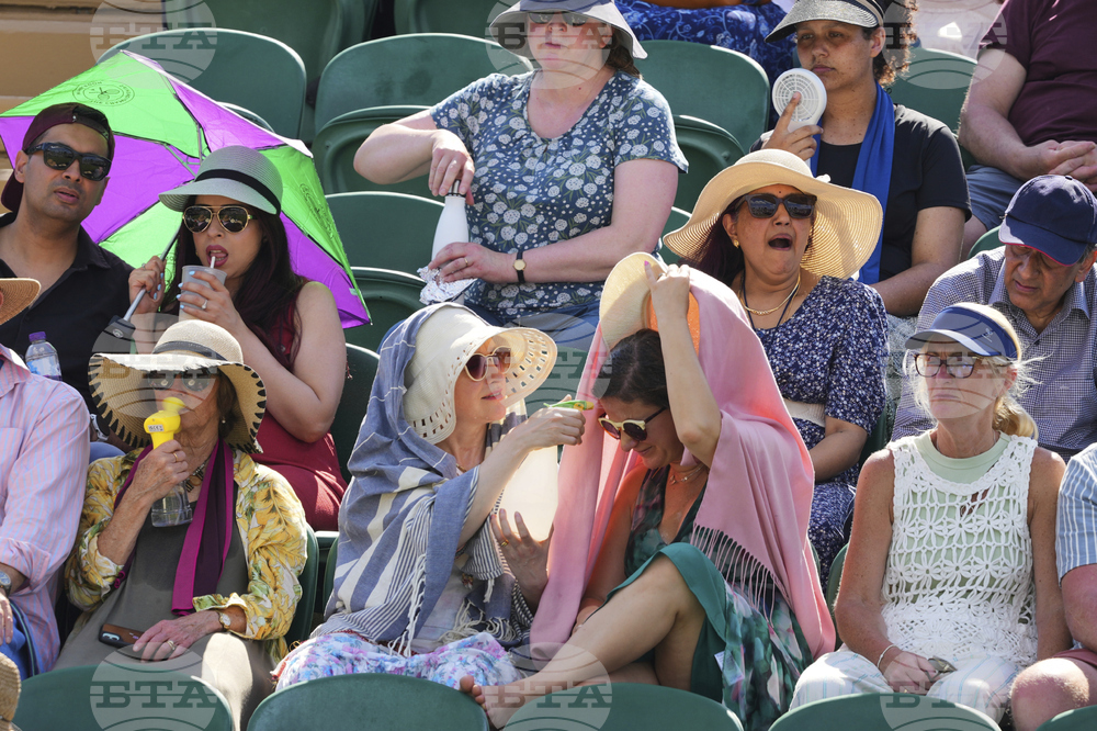 Britain Wimbledon Tennis Extreme Weather Heat