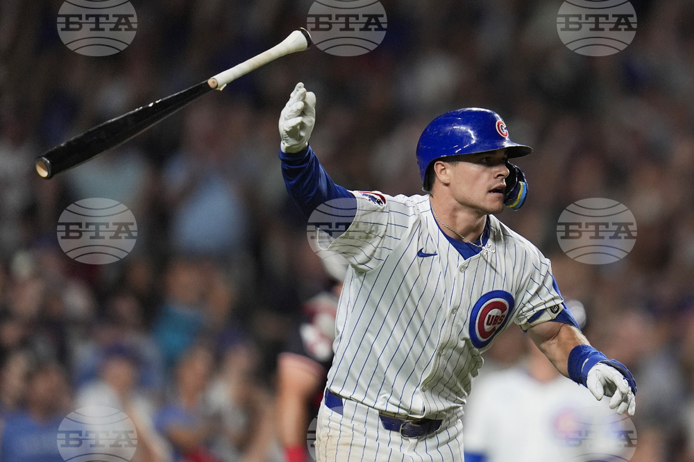 CORRECTION APTOPIX Guardians Cubs Baseball