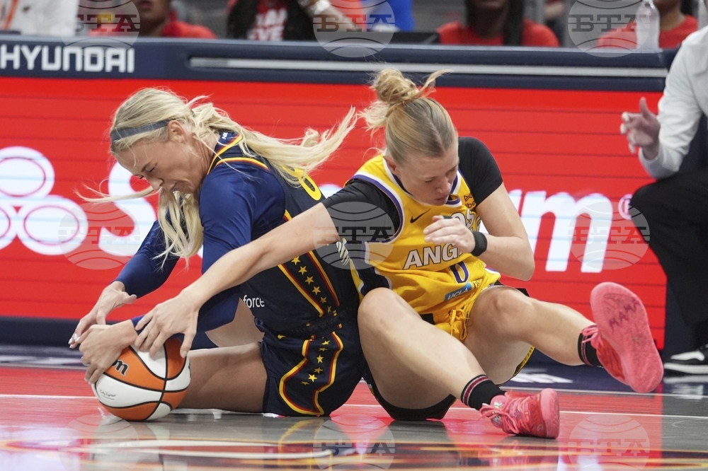 APTOPIX Sparks Fever Basketball