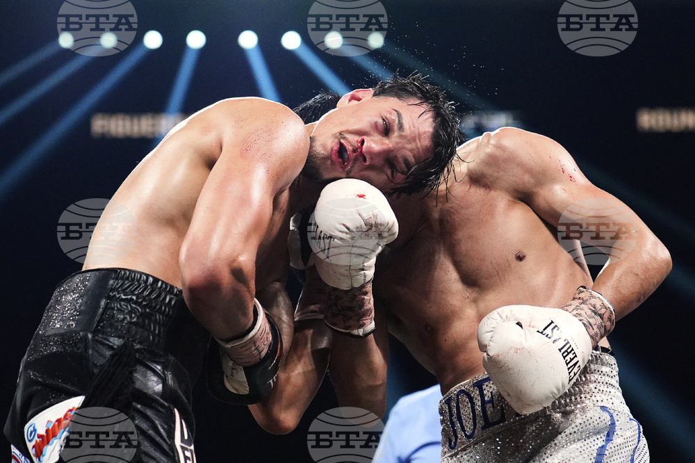 APTOPIX Figueroa Gonzalez Boxing