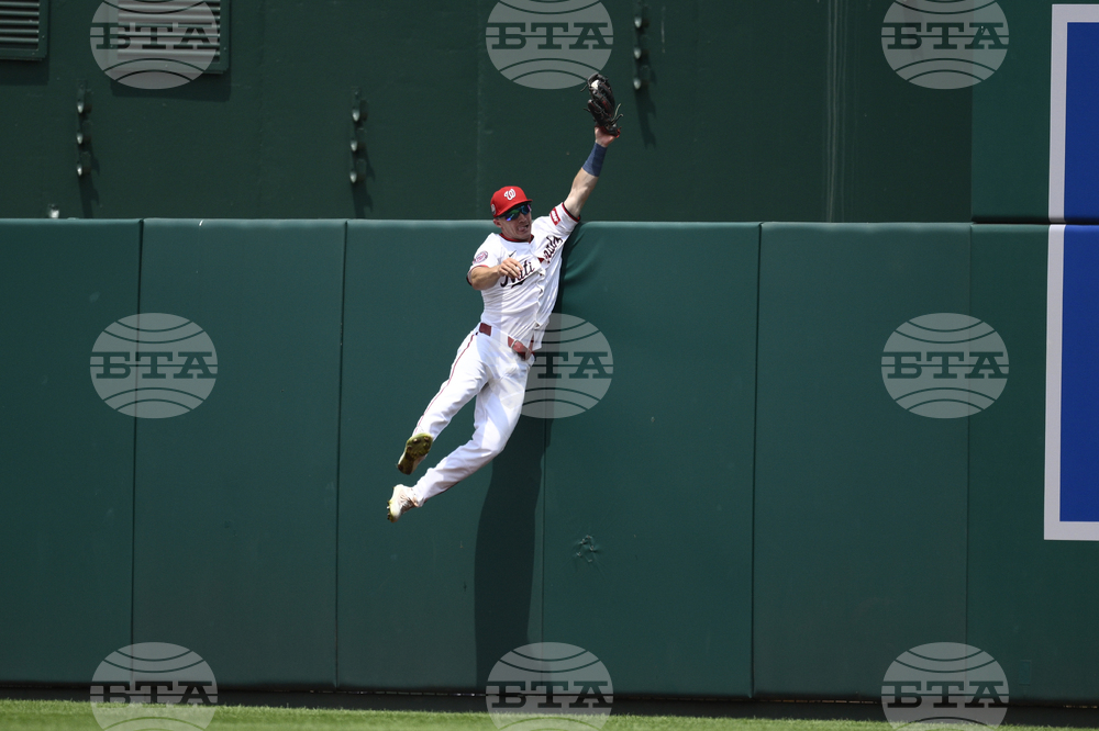 APTOPIX Reds Nationals Baseball