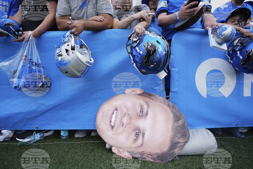 APTOPIX Lions Camp Football