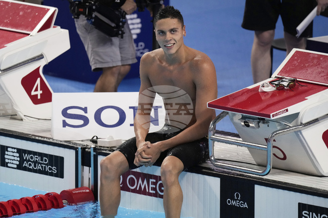 Давид Попович спечели световната титла на 100 метра свободен стил, Леон Маршан взе златото на 200 метра съчетано, но без световен рекорд