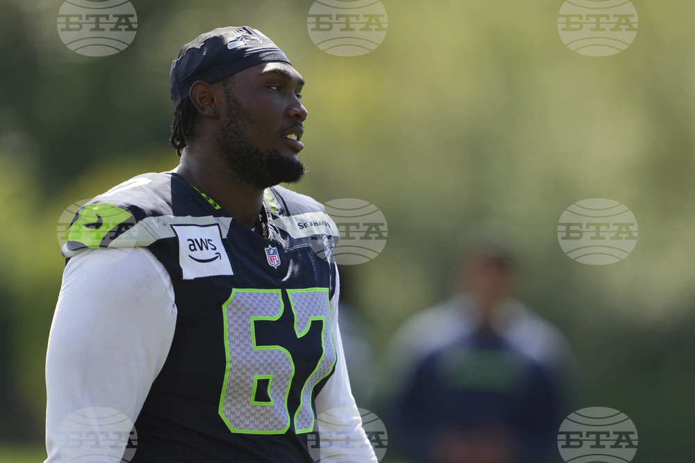Seahawks Cross Football