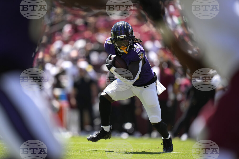APTOPIX Ravens Commanders Football