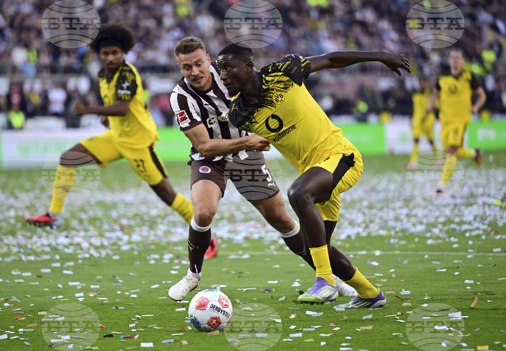 Борусия Дортмунд изпусна преднина от два гола след 85-ата минута и взе само точка при визитата си на Санкт Паули