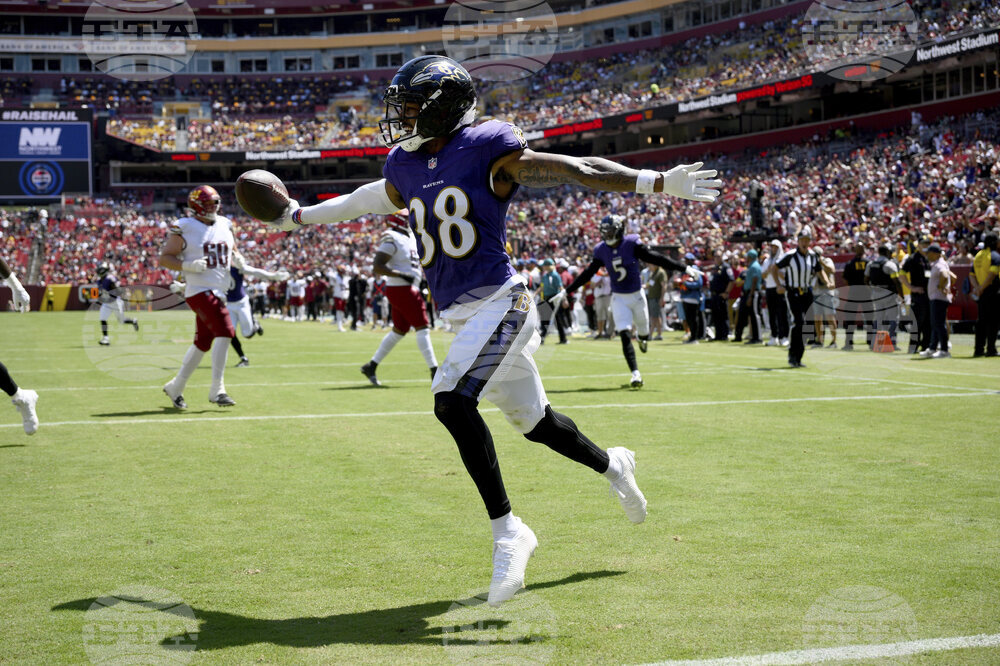 APTOPIX Ravens Commanders Football
