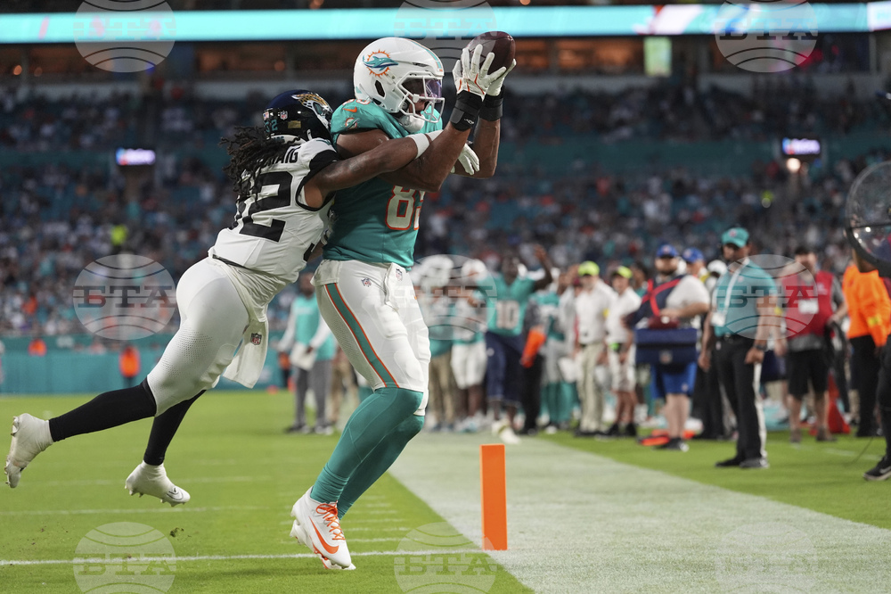 Jags Dolphins Football
