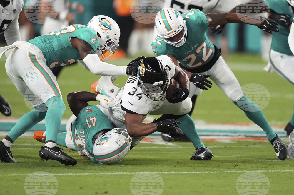 Jags Dolphins Football