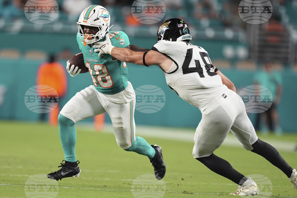 Jags Dolphins Football