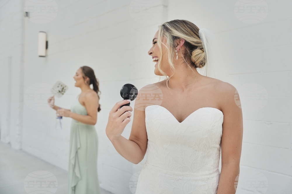 APTOPIX Climate Heat Weddings
