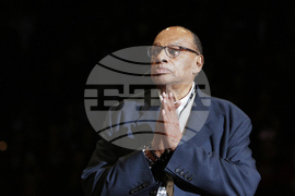 Obit-Raveling Basketball