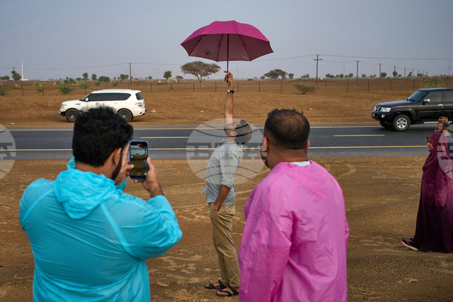 APTOPIX Emirates Rain