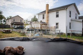 Infants Remains-Woman Charged