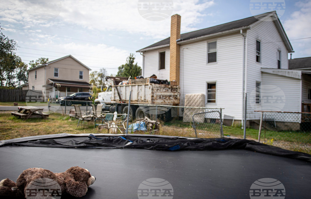 Infants Remains-Woman Charged