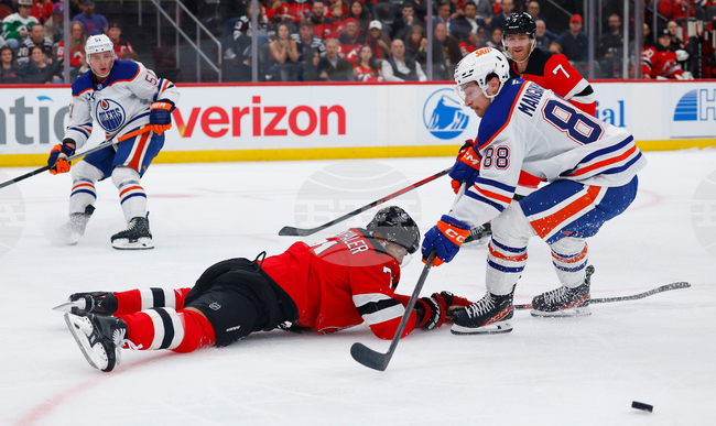 CORRECTION Oilers Devils Hockey