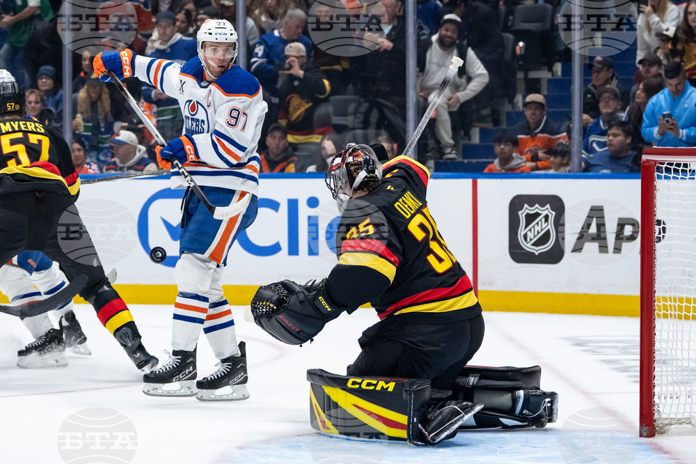 Oilers Canucks Hockey