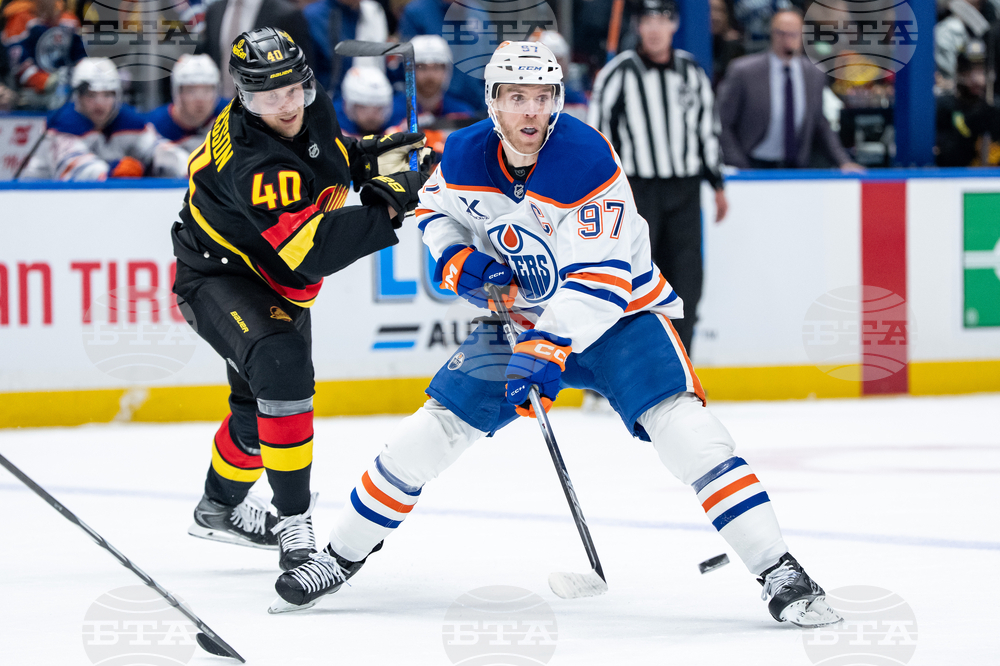 Oilers Canucks Hockey